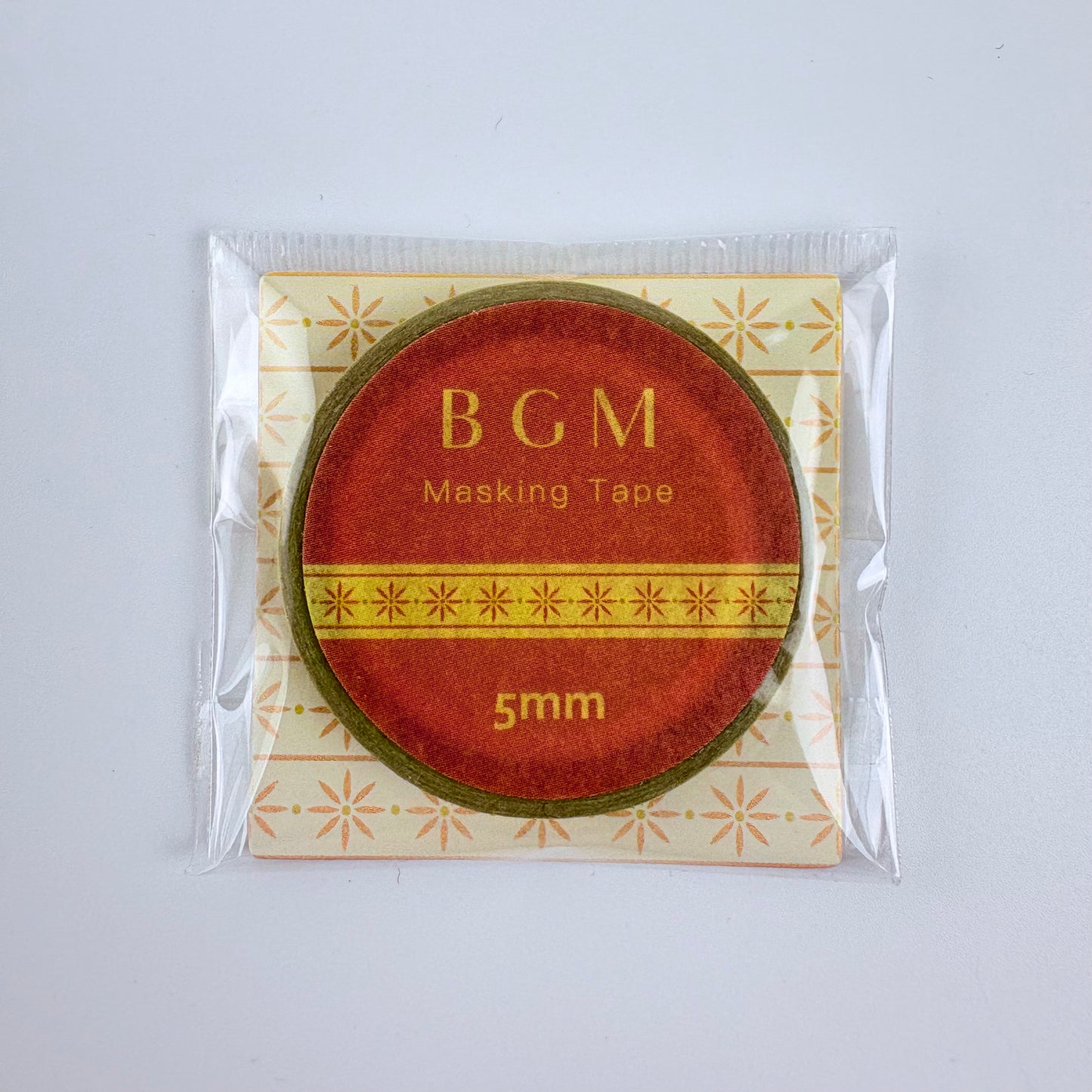 Washi páska BGM – Oranžové hvězdicové ornamenty, 5 mm × 5 m