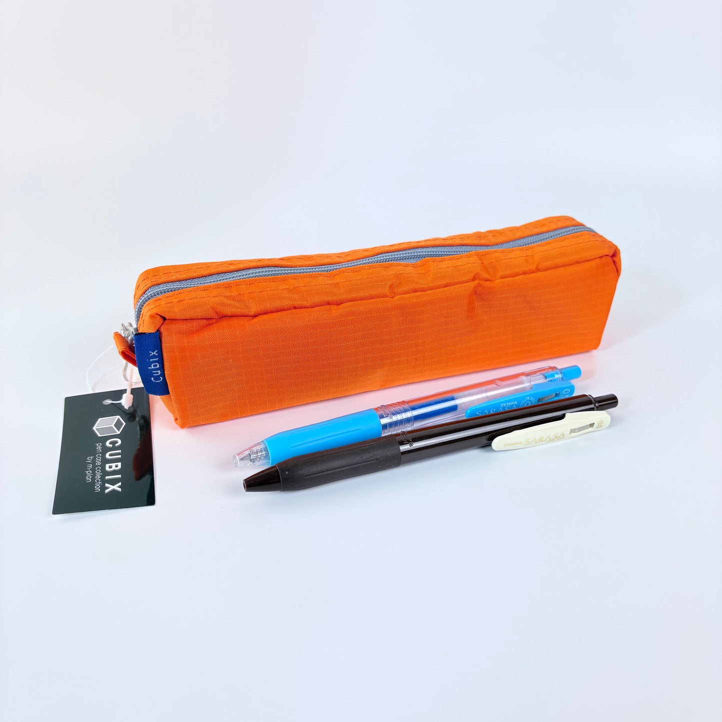 Penál CUBIX / M-PLAN – oranžové pouzdro na psací potřeby, japonský design