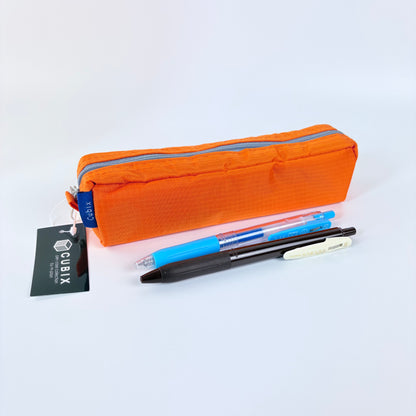 Penál CUBIX / M-PLAN – oranžové pouzdro na psací potřeby, japonský design