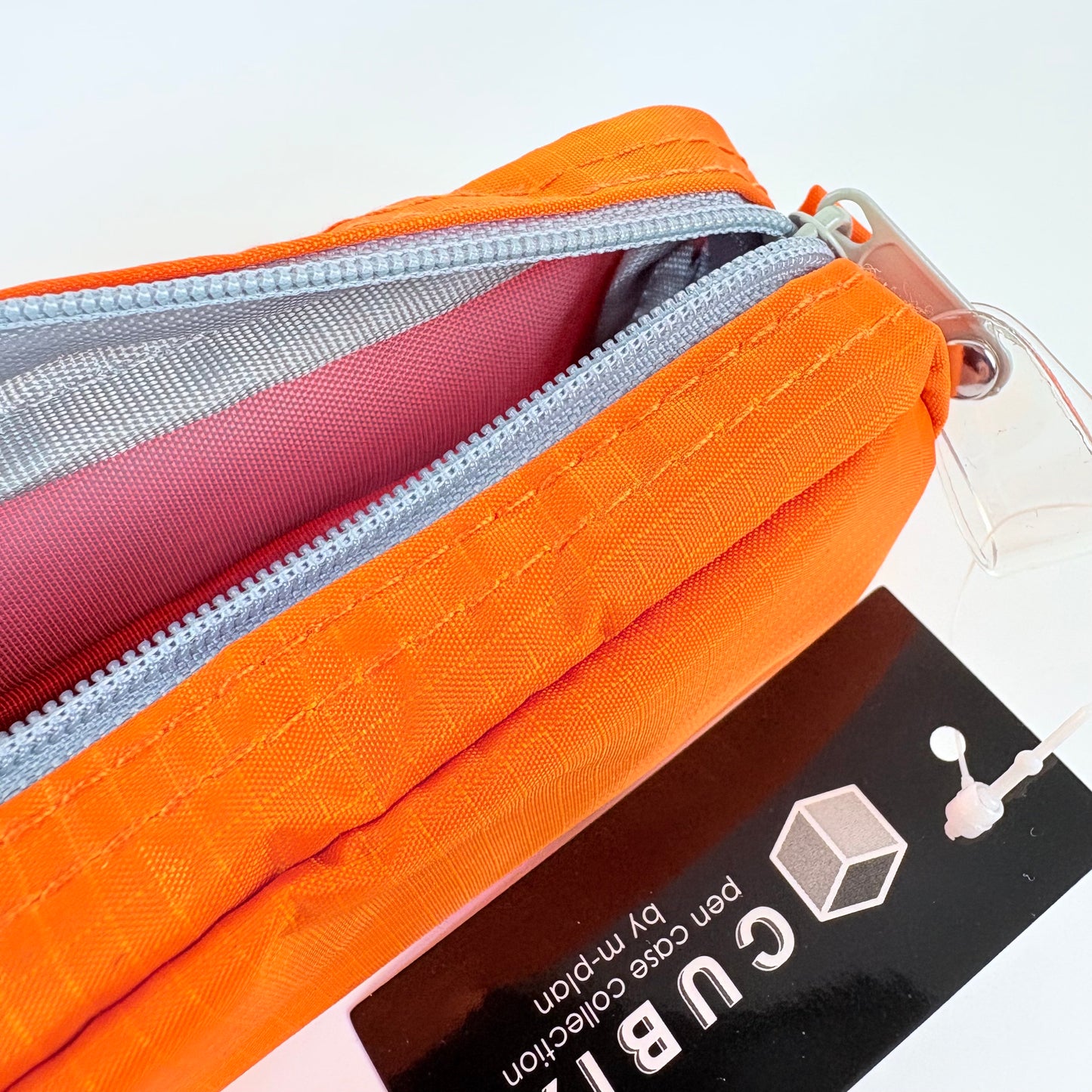 Penál CUBIX / M-PLAN – oranžové pouzdro na psací potřeby, japonský design