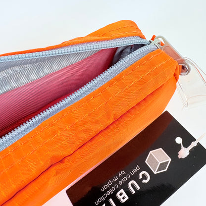 Penál CUBIX / M-PLAN – oranžové pouzdro na psací potřeby, japonský design