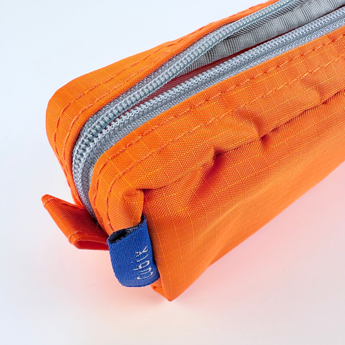 Penál CUBIX / M-PLAN – oranžové pouzdro na psací potřeby, japonský design