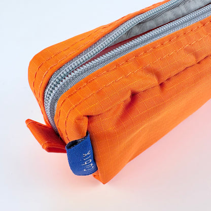 Penál CUBIX / M-PLAN – oranžové pouzdro na psací potřeby, japonský design